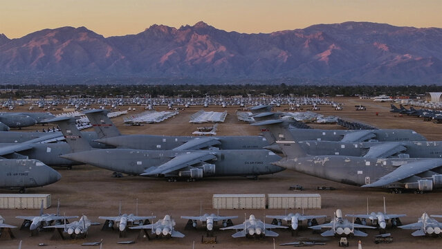 Aerial view of rows of retired military aircraft baking in the sun at the 309th Aerospace Maintenance and Regeneration Group (AMARG), Tucson, Arizona, United States.
