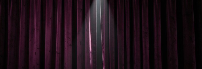 Dramatic spotlight on closed purple theater curtains