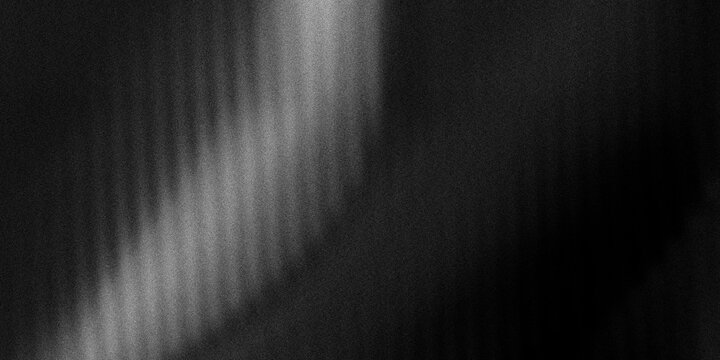 Monochrome abstract background with vertical ribbed lines and a soft motion blur, creating a sleek, moody, and cinematic effect for a professional presentation or a modern wallpaper.