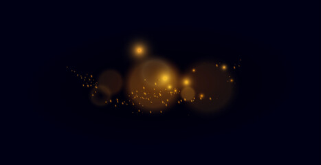 The dust is yellow. yellow sparks and golden stars shine with special light. Vector sparkles on a transparent background. Christmas light effect.
