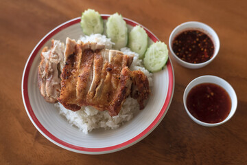 Grilled chicken breast with rice.