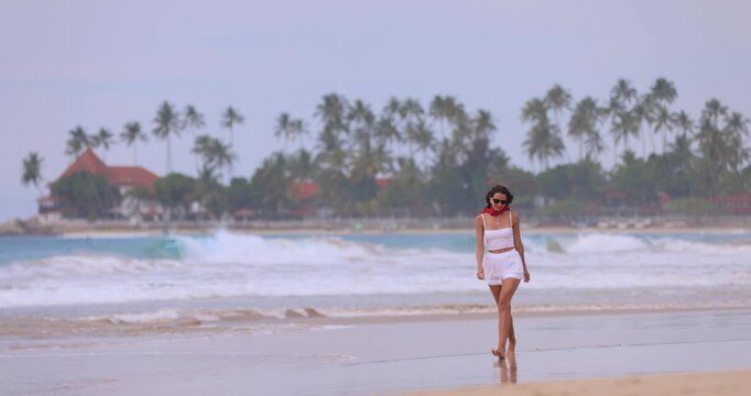 Joyful Asian Woman Walking On Dickwella Beach Sri Lanka Slow Motion