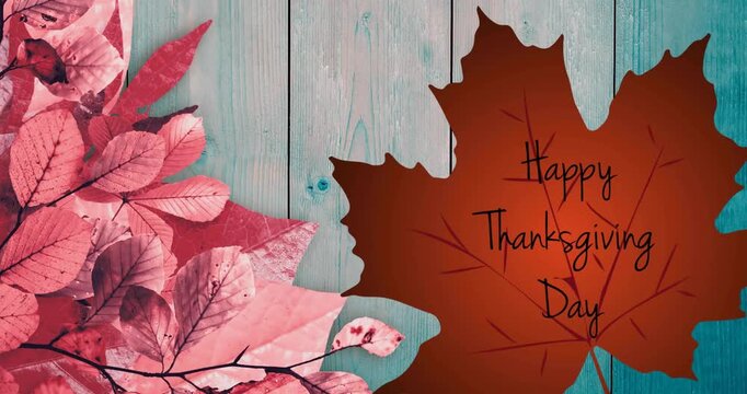 Animation of happy thanksgiving day text over autumn leaves background