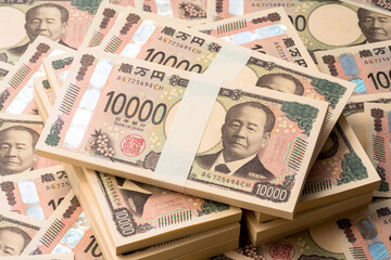 一万円札の束が並んだ背景