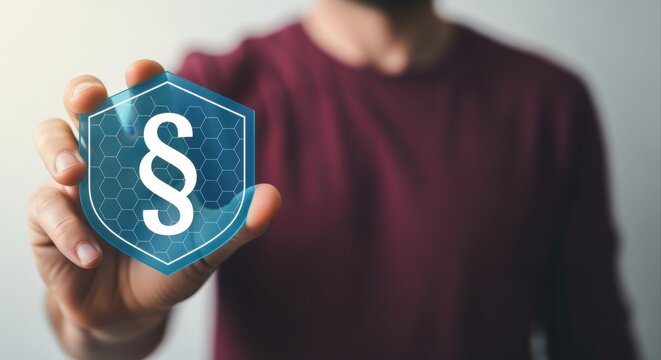 Man holding virtual paragraph symbol icon, law and justice concept, legal regulations, cybersecurity protection