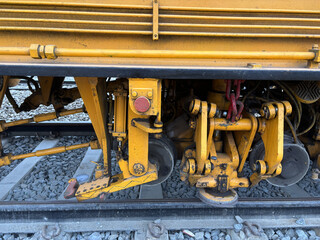 Fototapeta premium Control system of air with metal hose arranged on the body of train track making machine