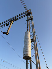 Weights than is hung on a electric locomotive powering system. Parts of train track system