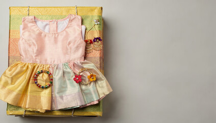 Celebration of Ugadi with traditional attire and decorative items on display from India