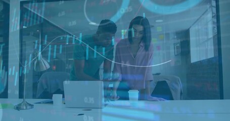 Colleagues reviewing finance data as graphs overlaying laptop and scrolling phone comparing figures - Powered by Adobe