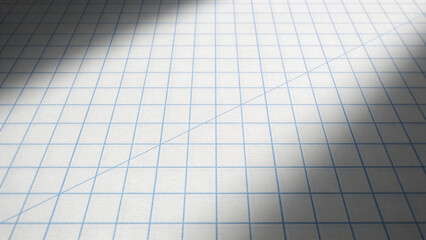 Close-up of Blue Grid Paper Background with Dramatic Lighting