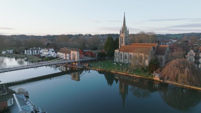 Marlow, UK Sunset static over the river at sunset looking back at town.