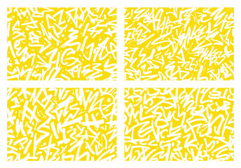 Fototapeta premium Abstract yellow and white graffiti-style vector pattern set with bold handwritten marks, delivering bright, high-energy textures for modern graphic and surface design.