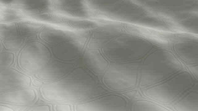 Abstract video of fabric filling the frame with smooth, continuous motion. Fabric behaves like a soft landscape. 