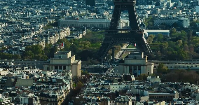 Aerial panning view of the historic center of Paris with the Eiffel Tower at summer day. Panorama of Paris from above. Aerial View on Eiffel Tower and Champ de Mars