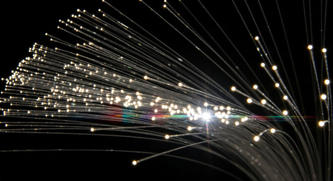 digital waveform lines forming smooth waves, glowing gradients of purple and blue - Powered by Adobe