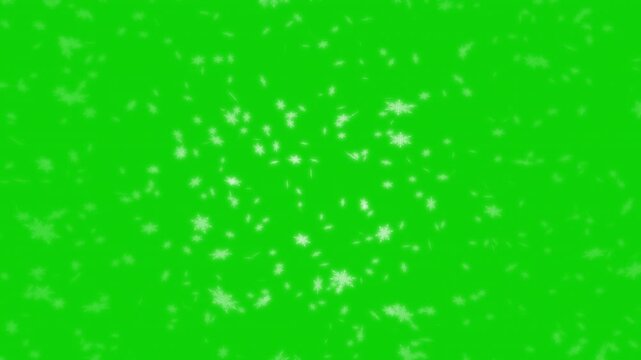 White snowflakes being lit up and falling down on green background. Abstract background for Merry Christmas, Happy Holidays, Season's greetings, Happy Valentine's day and winter season.