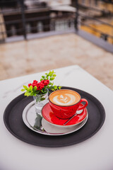 A cup of coffee with foam