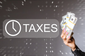 Taxation and financial planning, taxpayer holds cash near taxes symbol, manages income obligations, budgeting, fiscal responsibility and personal finance compliance.