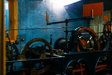 Victorian Age mechanic clock work mechanism metallic cogs indoor plant space view