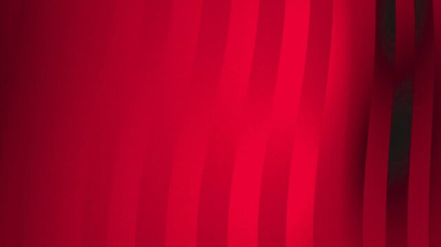 Elegant Red Abstract Background with Soft Wavy Stripes and Smooth Gradient Shadows