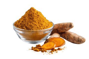 Bright yellow turmeric powder in glass bowl with roots and slices spice ingredient