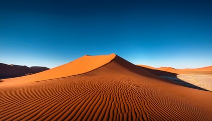 Sundown on the Red Dunes: A Scenic View of a Saharan Desert