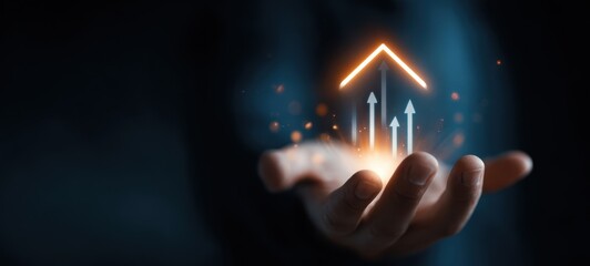 The hand holding glowing upward arrows symbolizing business growth and digital innovation