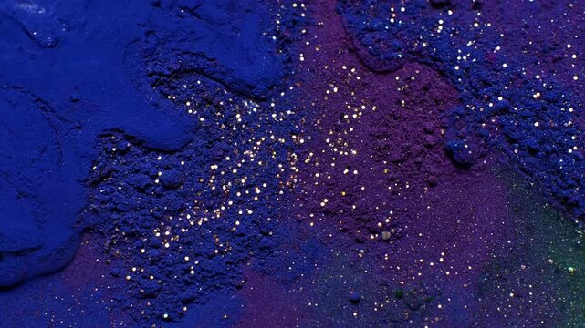 Fluid Granulation Unfolding Dynamic shot of ink or watercolor pigments spreading and settling on a surface, forming a beautiful granulated texture that subtly sparkles as it dries or moves.