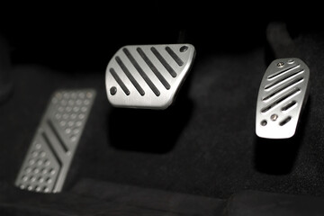 Closeup pedal of car brake. To slow down, stop the car both normal and abruptly, transfer the...
