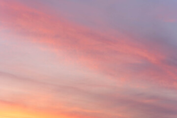 Obraz premium Soft pastel sky with gentle color gradient at sunset