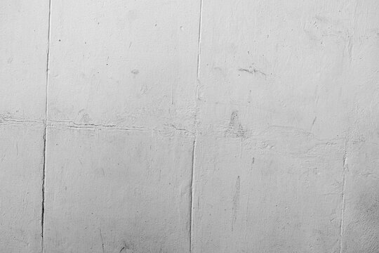 Grey aged paper background with folded lines and subtle texture. Clean vintage surface.