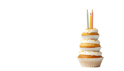 A stack of cupcakes with white frosting and colorful candles on transparent background