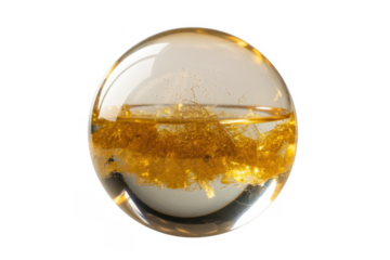 Clear glass sphere with gold flecks inside transparent isolated on a transparent background