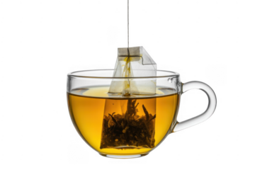 Tea bag steeping in a clear cup liquid isolated on a transparent background