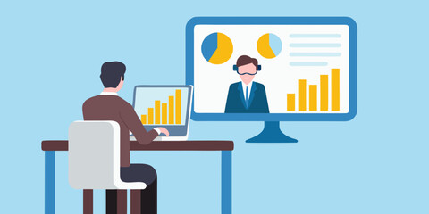 man working on laptop with big monitor displaying graphs and colleague