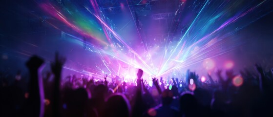 The Concert Crowd Under Vibrant Neon Lasers and Colorful Stage Lights