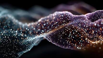Abstract render depicting a flowing, blurred wave of glittering particles in gradient hues