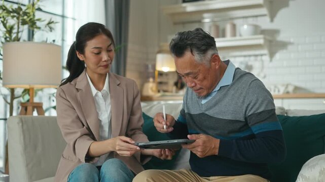 Financial advisor,realtor agent,insurance,lawyer,Manage your retirement fund concept.Financial advisor showing presentation on computer,deal shake hand to happiness Elderly asian couple retirement