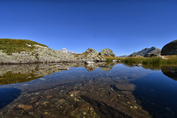 Naklejka premium The Bellacombe Lakes are picturesque bodies of water in the valley above La Thuile.