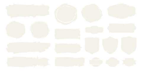Collection of hand-drawn brush stroke shapes and badges for design elements isolated on white background
