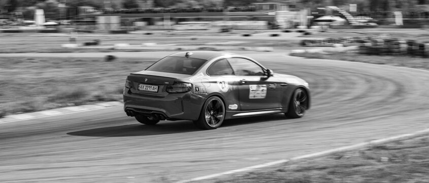 racing car. motorsport. circuit racing. dangerous moments on the track. high vehicle speed. sharp turn. demolition of wheels.