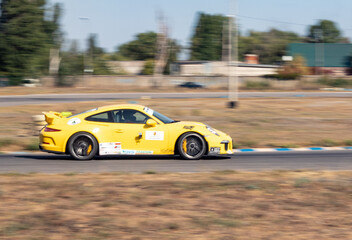 Obraz premium racing car. motorsport. circuit racing. dangerous moments on the track. high vehicle speed. sharp turn. demolition of wheels.