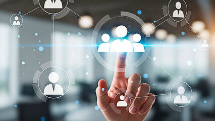 A hand interacting with a network of people icons for the concept of teamwork and collaboration