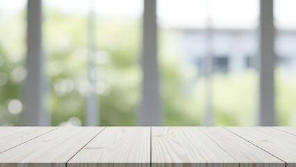 A wooden tabletop in front of a large window overlooking a blurred sunny outdoor scene