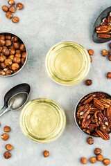 Assorted Nuts with Oil on Plate, Hazelnuts and Pecans Still Life