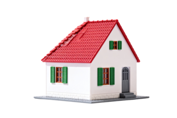 Small white toy house with red roof and green shutters
