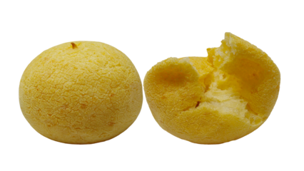 Yellow steamed bun with overflowing filling isolated on transparent  background.