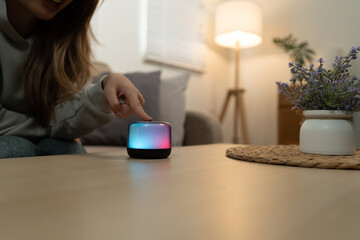 Cheerful woman use smartphone, enjoy personal chat exchanges messages through mobile application, learn new AI platform for business or fun, distracted from workflow on laptop in workplace.