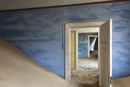 At Kolmanskop, the abandoned ghost town of the diamond days of the early 1900 and of German origin. Inside the restricted Diamond Area east of the coastal town of L&uuml;deritz. Namib Desert, Namibia