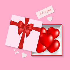 Romantic postcard with a gift box and hearts. I love you. 